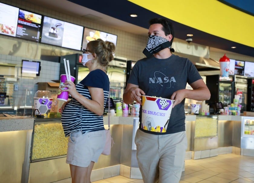 How safe is it to go to indoor movie theaters during the COVID-19 pandemic?